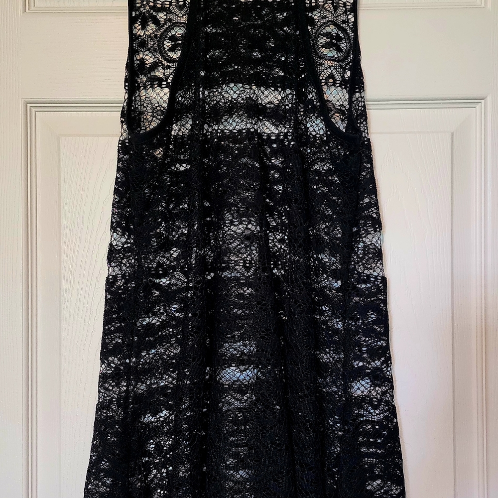Polyester lace black bathing suit cover up. Medium